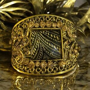 Cuff Bracelet in Gold and Black Statement Piece. 
For any special outing.